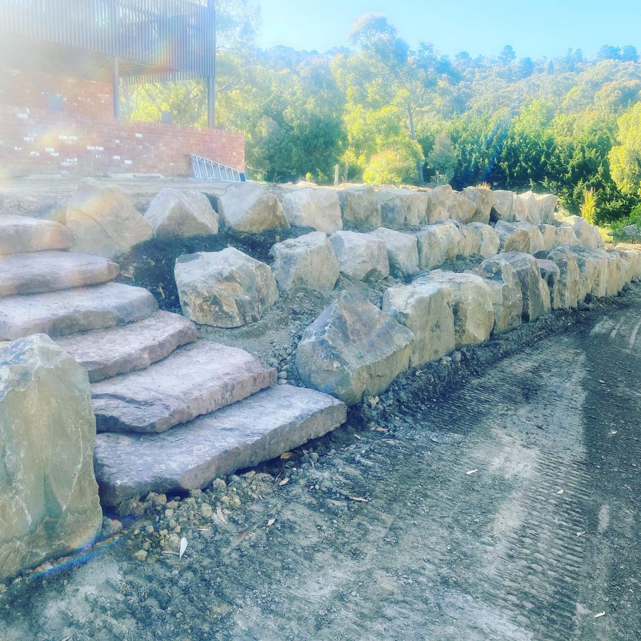Rock Retaining Wall Cost Archives DWK Earthworks